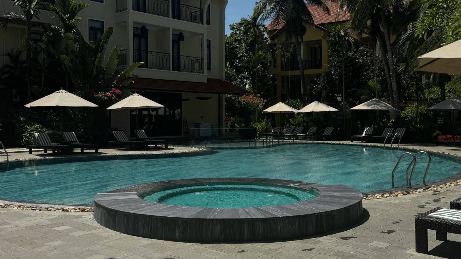 Tim Phạm at Anmira Hội An swimming pool