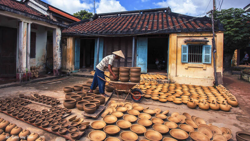 Thanh Ha Pottery Village offers a unique hands-on cultural activity.